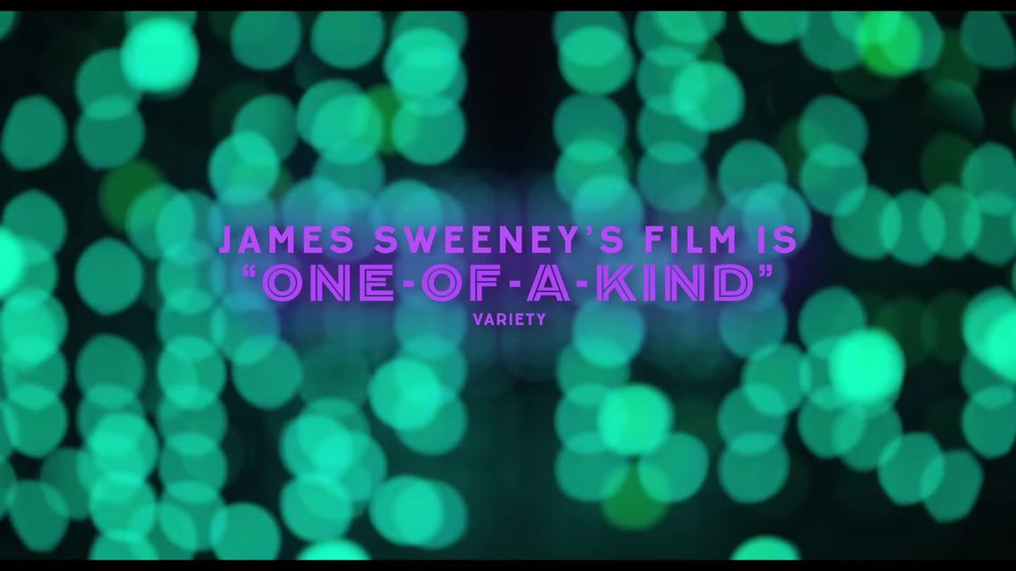 Turquoise lights behind the Twinless trailer review quote “One-of-a-kind” from Variety.